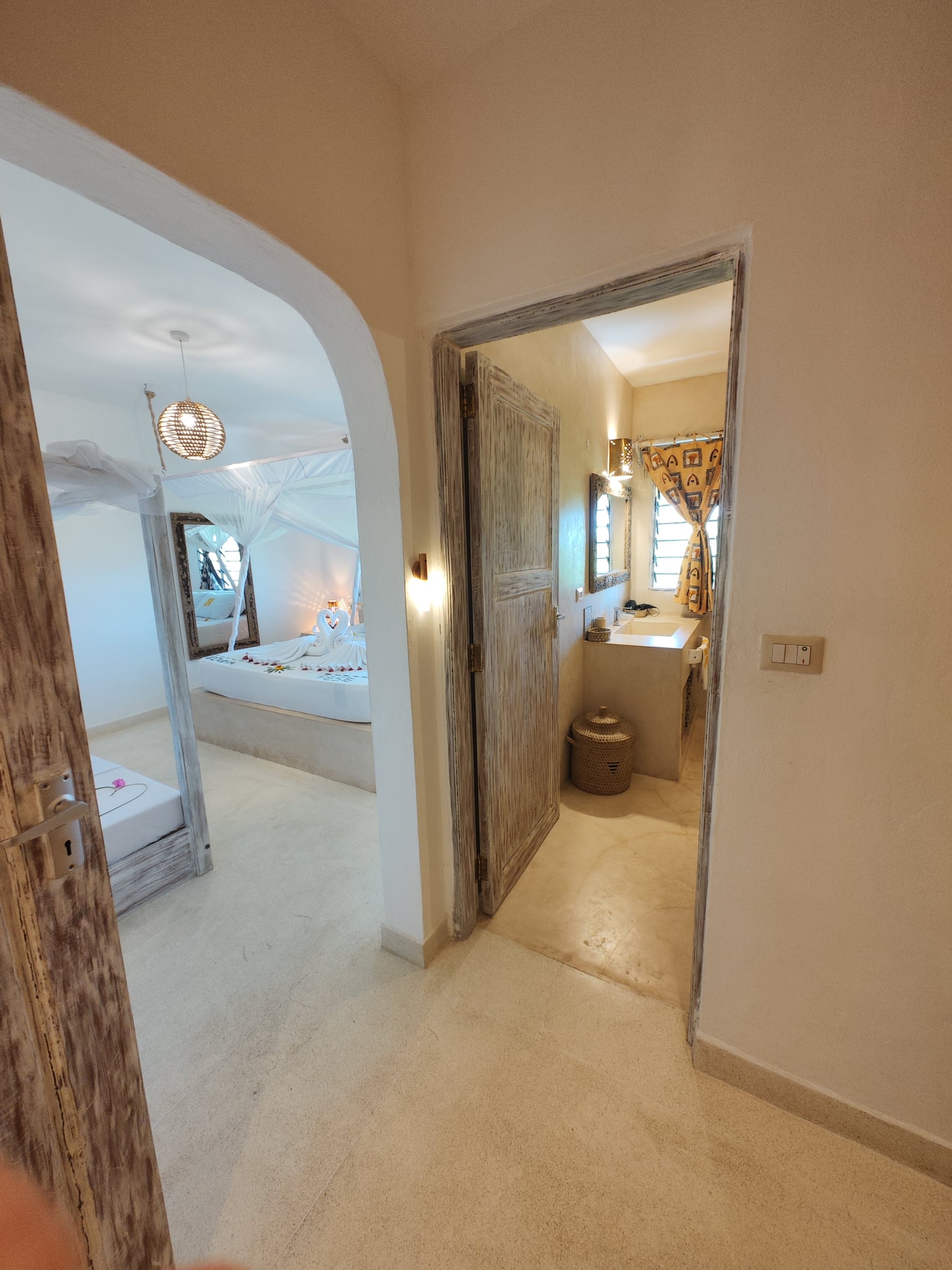 Luxury bedroom with canopy bed at RiccArDella House, Watamu, Kenya